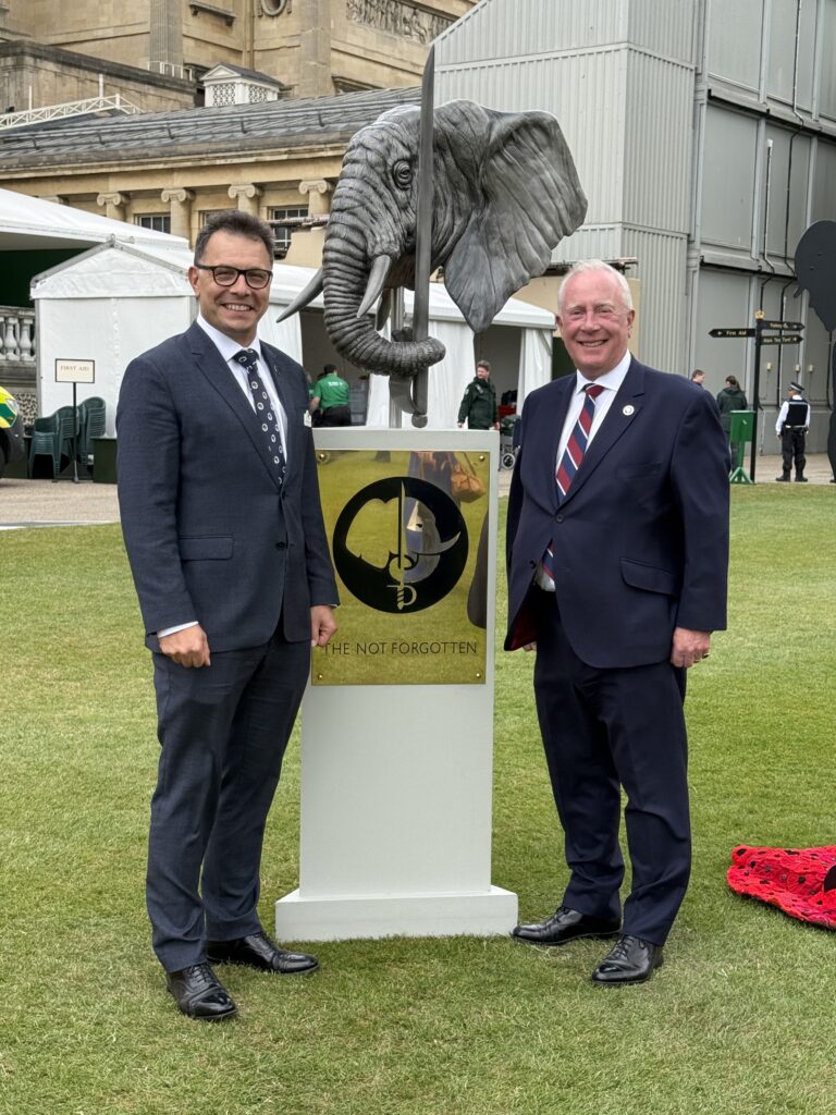 Peter Hewitt and Richard Walker OBE beside The Not Forgotten elephant statue, the emblem of the charity.